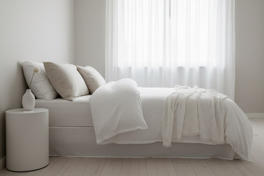Neatly made bed with pure cotton sheets — pre-summer bedding checklist for Indian homes